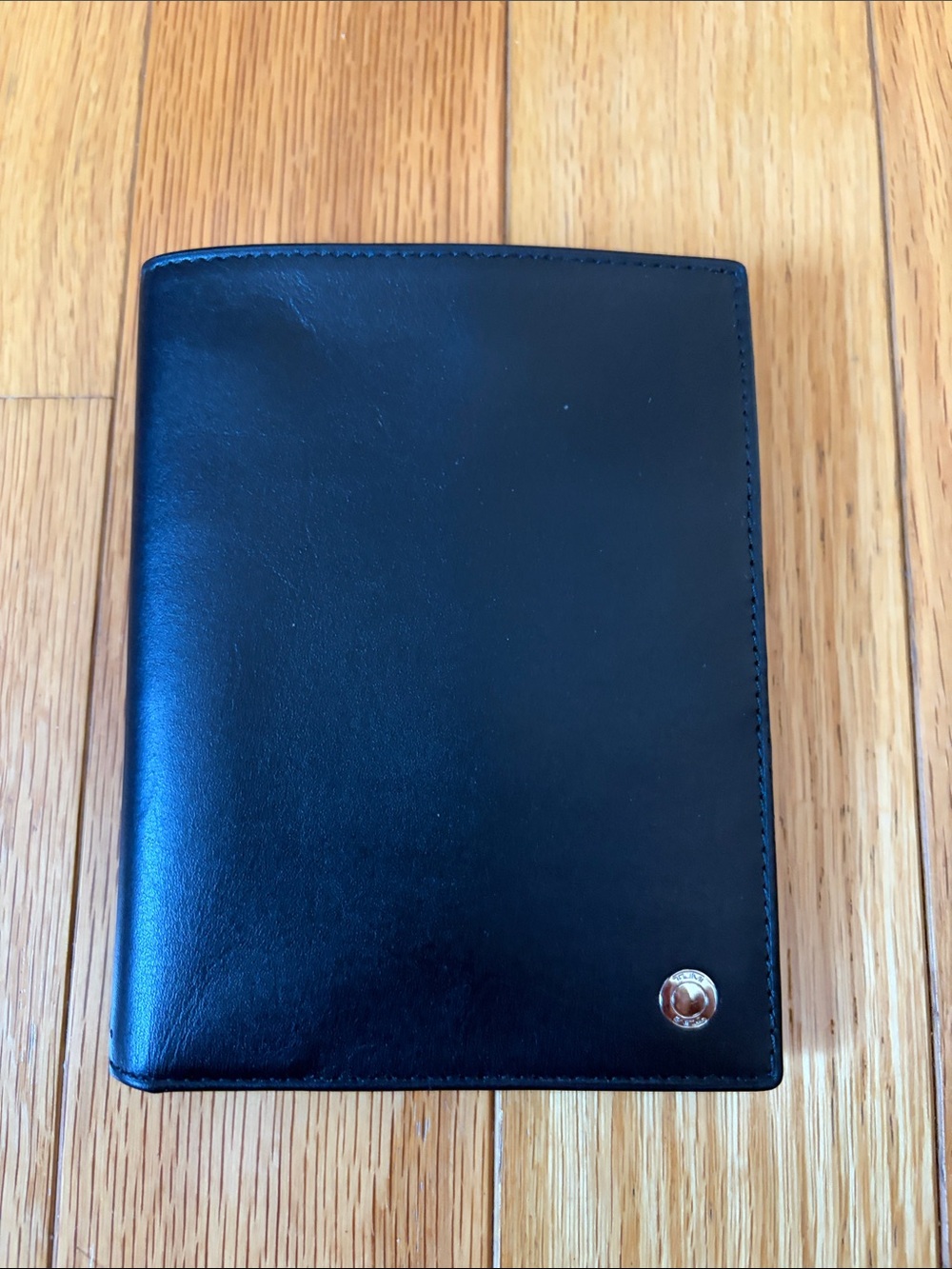 Tumi Black Leather Passport Wallet with Silver Accent